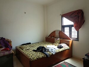 Bedroom in 2 BHK Builder Floor at Laxman Vihar – for Sale