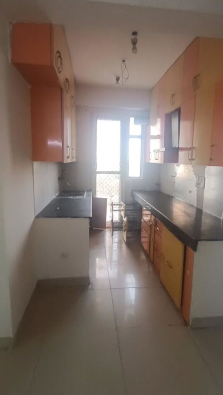 Kitchen, ajnara-grand-heritage 3 Bedroom 1395 Sq.Ft. Apartment In Sector 74 Noida 10242573