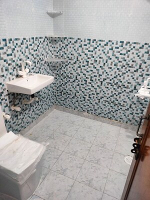 Bathroom in 3 BHK Apartment at Defence Colony – for Sale