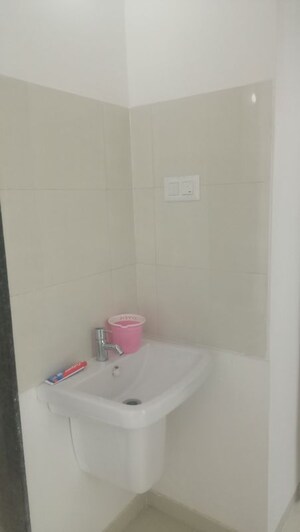 Bathroom in 2 BHK Apartment at Royal Ishana, Thergaon – for Rent
