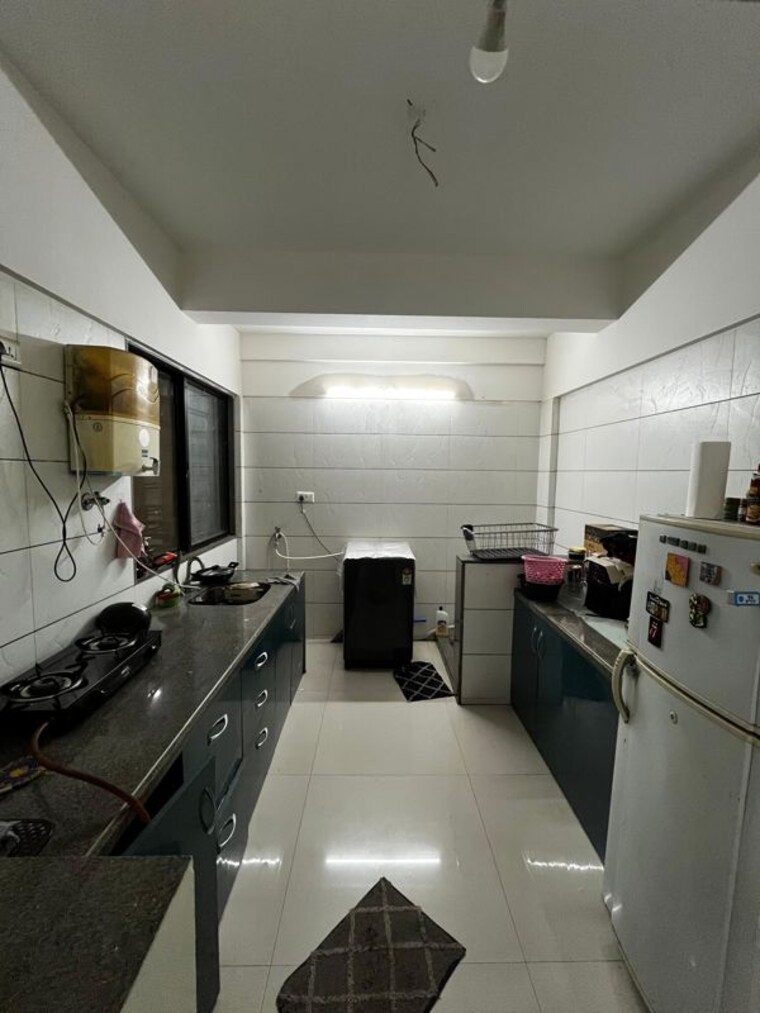 Kitchen, camelot-society 1 Bedroom 667 Sq.Ft. Apartment In Viman Nagar Pune 10242662