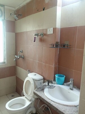 Bathroom in 3 BHK Apartment at Mahagun Mywoods III, Sector 16c Greater Noida – for Rent