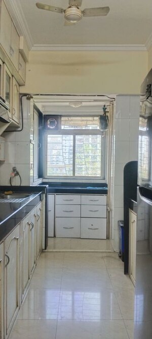 Kitchen in 3.5 BHK Apartment at Nirmal Lifestyle Residency CHS Ltd, Mulund West – for Rent