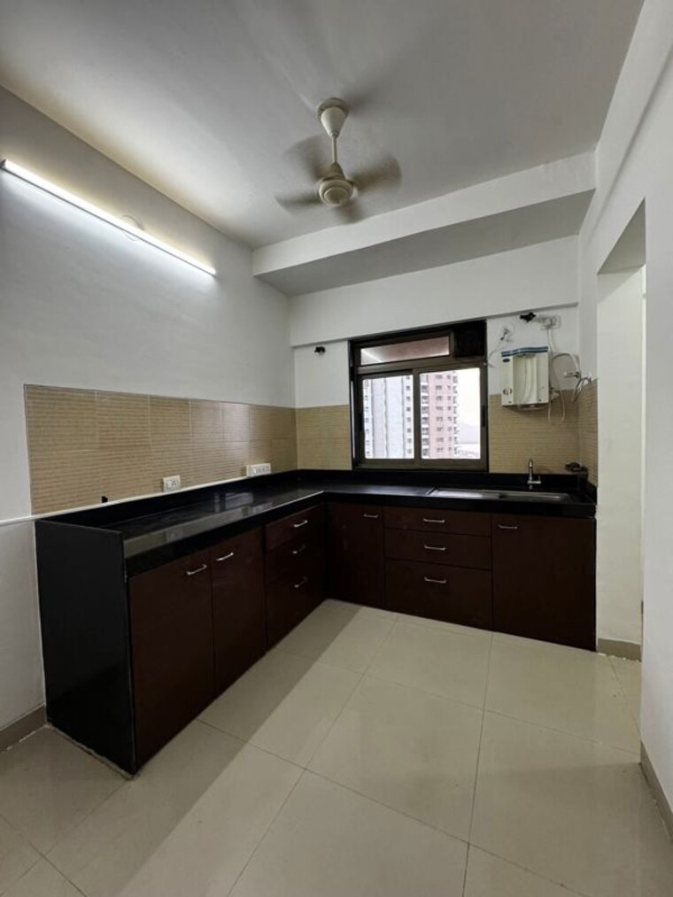 Kitchen, lodha-splendora 3 Bedroom 1124 Sq.Ft. Apartment In Ghodbunder Road Thane 10243419
