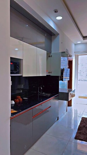 Kitchen in 1 RK Apartment at Supertech North Eye, Sector 74 – for Rent