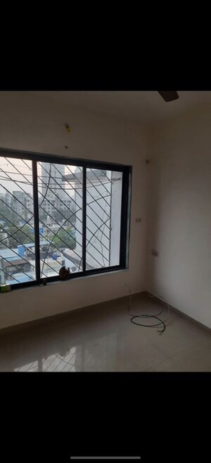 Room in 2 BHK Apartment at Ganesh Darshan CHS Kandivali, Kandivali West – for Rent