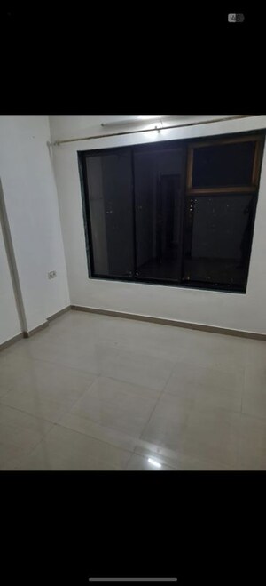Room in 2 BHK Apartment at Ganesh Darshan CHS Kandivali, Kandivali West – for Rent