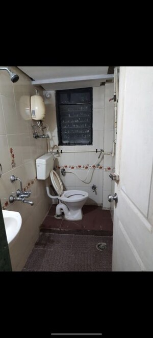 Bathroom in 2 BHK Apartment at Ganesh Darshan CHS Kandivali, Kandivali West – for Rent
