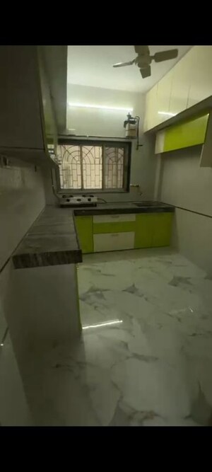 Kitchen in 2.5 BHK Apartment at Amarjyothi Chs, Vashi Sector 14 – for Rent