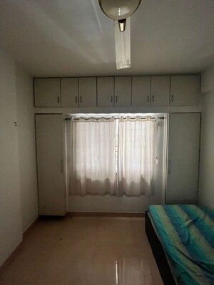 Bedroom in 2 BHK Apartment at Anshul Shree Hans Garden, Dhanori – for Rent