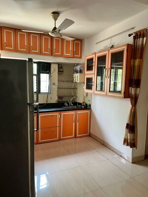 Kitchen in 2 BHK Apartment at Anshul Shree Hans Garden, Dhanori – for Rent