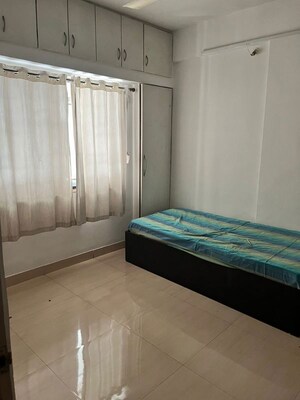 Bedroom in 2 BHK Apartment at Anshul Shree Hans Garden, Dhanori – for Rent