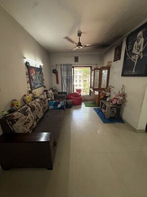 Living Room in 2 BHK Apartment at Habtown Countrywoods Apartment, Kondhwa Budruk – for Rent