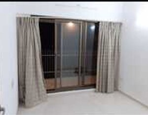 Bedroom in 2 BHK Apartment at Omkar Ananta, Goregaon East – for Sale