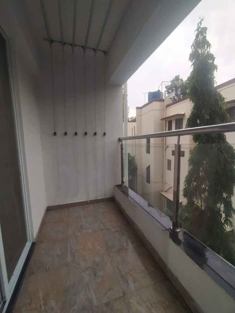 Balcony, dhanlaxmi-residency-kothrud 2 Bedroom 850 Sq.Ft. Apartment In Kothrud Pune 10244209