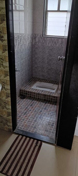 Bathroom in 2 BHK Apartment at Mittal Arcvista, Dhanori – for Rent