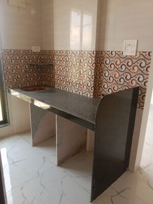 Kitchen in 1 BHK Apartment at Maad Yashwant Pride-Kini Complex, Naigaon East – for Sale