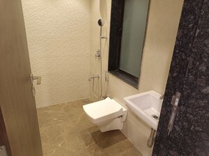 Bathroom in 2 BHK Apartment at Lalani Valentine Apartment 1 Wing D, Malad East – for Rent