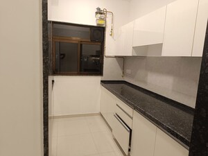 Kitchen in 2 BHK Apartment at Lalani Valentine Apartment 1 Wing D, Malad East – for Rent