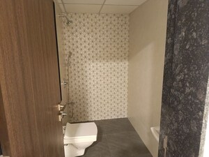 Bathroom in 2 BHK Apartment at Lalani Valentine Apartment 1 Wing D, Malad East – for Rent