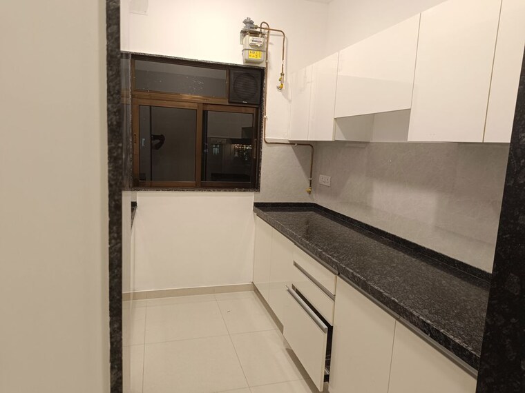 Kitchen, arcade-serene 2 Bedroom 604 Sq.Ft. Apartment In Malad West Mumbai 10244293