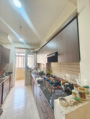 Kitchen in 2 BHK Apartment at Aims Golf City, Sector 75 – for Rent
