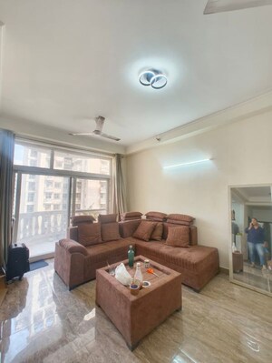 Living Room in 2 BHK Apartment at Aims Golf City, Sector 75 – for Rent