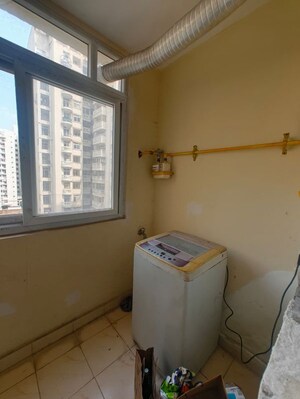 Living Room in 2 BHK Apartment at Aims Golf City, Sector 75 – for Rent