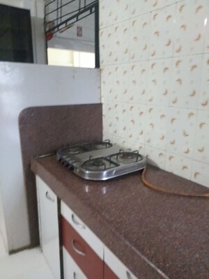 Kitchen in 3 BHK Apartment at Dhangauri Apartment, Dahanukar Colony – for Rent