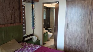 Bedroom in 2 BHK Apartment at Dosti West County, Balkum Pada – for Rent