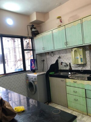 Kitchen in 2 BHK Apartment at Rustomjee Raag, Goregaon East – for Rent