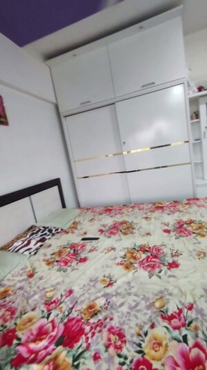 Bedroom in 1 BHK Apartment at Lokhandwala Riviera Tower, Kandivali East – for Sale