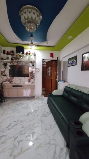 Living Room in 1 BHK Apartment at Lokhandwala Riviera Tower, Kandivali East – for Sale