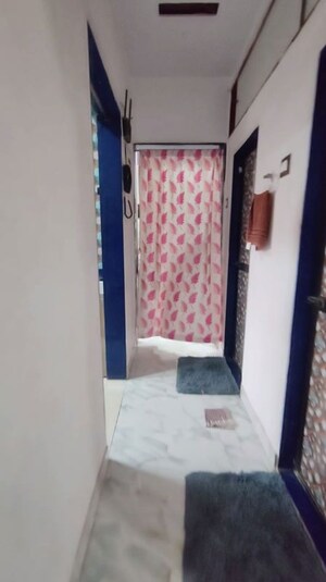 Bedroom in 1 BHK Apartment at Lokhandwala Riviera Tower, Kandivali East – for Sale