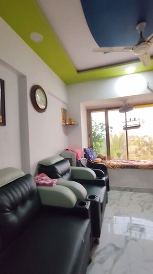 Living Room in 1 BHK Apartment at Lokhandwala Riviera Tower, Kandivali East – for Sale