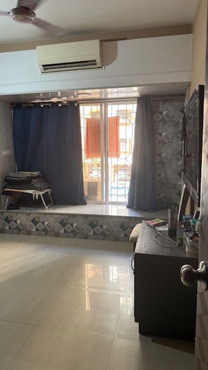 Living Room in 2 BHK Apartment at Mantri Park, Goregaon East – for Rent