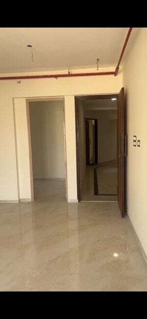 Room in 2 BHK Apartment at Bhutra Mangal Karini Sky Breeze, Goregaon West – for Sale