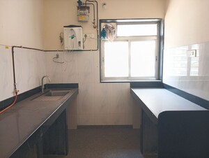 Kitchen in 1 BHK Apartment at Kalpataru Hills Phase II, Manpada – for Sale