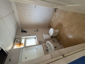 Bathroom in 3 BHK Apartment at Piedmont Taksila Heights, Sector 37c – for Rent