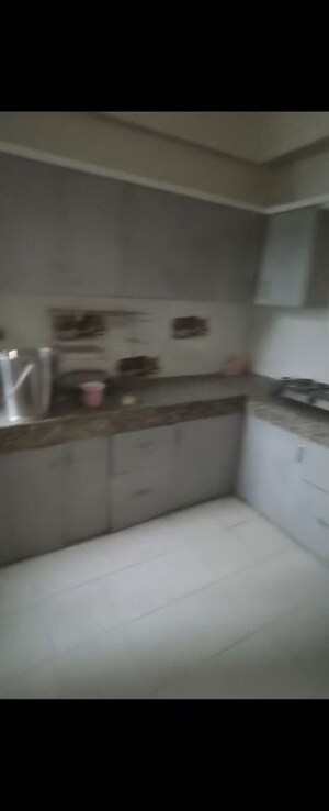Kitchen in 3 BHK Apartment at Proview Officer City, Raj Nagar Extension – for Sale
