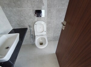 Bathroom in 1 BHK Apartment at Omkar Signet, Malad East – for Rent