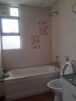 Bathroom in 3 BHK Apartment at Emaar Palm Gardens, Sector 83 – for Sale