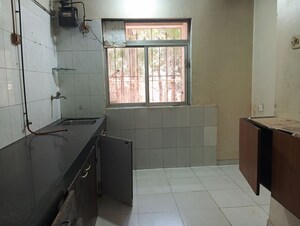Kitchen in 2 BHK Apartment at Happy Valley, Manpada – for Sale