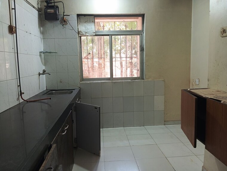 Kitchen, happy-valley 2 Bedroom 646 Sq.Ft. Apartment In Manpada Thane 10244890