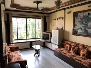 Living Room in 2 BHK Apartment at Raheja Township, Malad East – for Rent