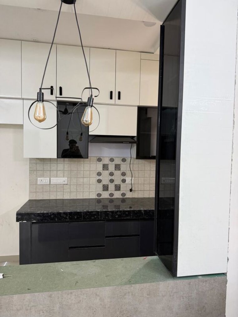 Kitchen, pareena-om-apartments 2 Bedroom 565 Sq.Ft. Apartment In Sector 112 Gurgaon 10244885