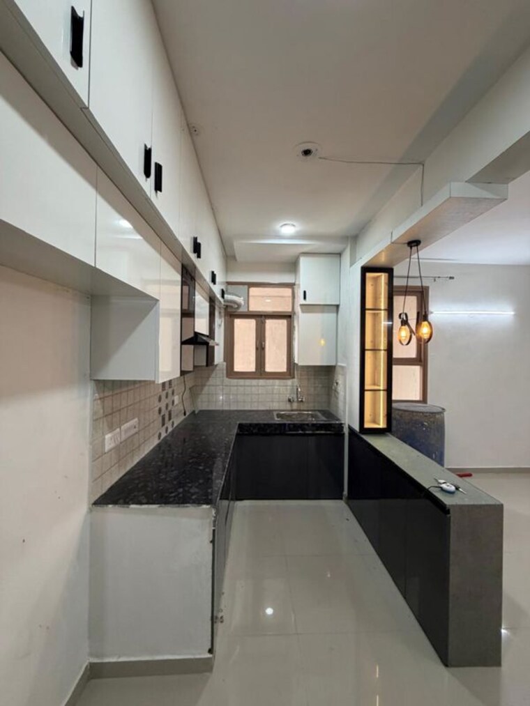 Kitchen, pareena-om-apartments 2 Bedroom 565 Sq.Ft. Apartment In Sector 112 Gurgaon 10244885