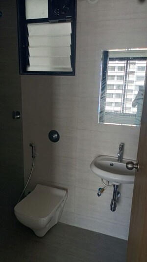 Bathroom in 2 BHK Apartment at Unique Youtopia, Kharadi – for Rent
