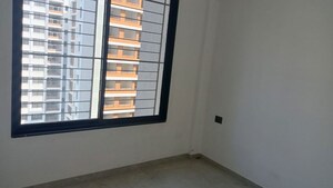 Room in 2 BHK Apartment at Unique Youtopia, Kharadi – for Rent