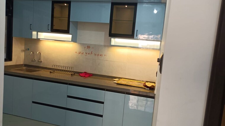 Kitchen, unique-youtopia 2 Bedroom 750 Sq.Ft. Apartment In Kharadi Pune 10244967